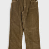 Brown corduroy pants on a white background