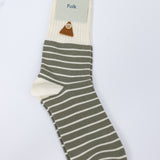Green and beige striped sock with 'Folk' label on a white background