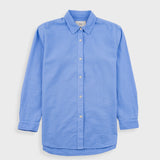 Blue button-up shirt on a light gray background