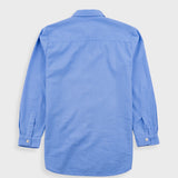 Blue shirt on a light gray background