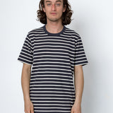 Man wearing a striped shirt against a white background