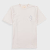 A light cream-colored short-sleeve t-shirt with a small, minimalist line-art profile graphic on the left chest, displayed flat against a light gray background.