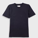 Close-up of a dark navy crewneck t-shirt with a white neck label reading 'Folk'.