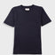 Close-up of a dark navy crewneck t-shirt with a white neck label reading 'Folk'.