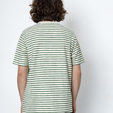 Person wearing a striped shirt against a white background