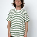 Man wearing a striped t-shirt against a white background