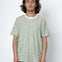 Man wearing a striped t-shirt against a white background