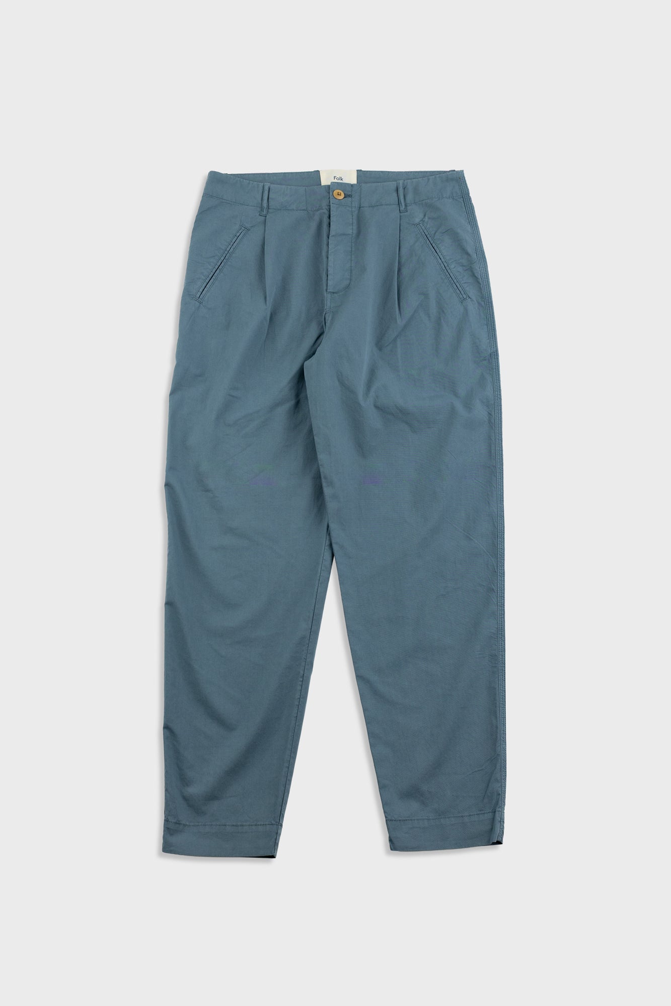 Blue pants on a light gray background