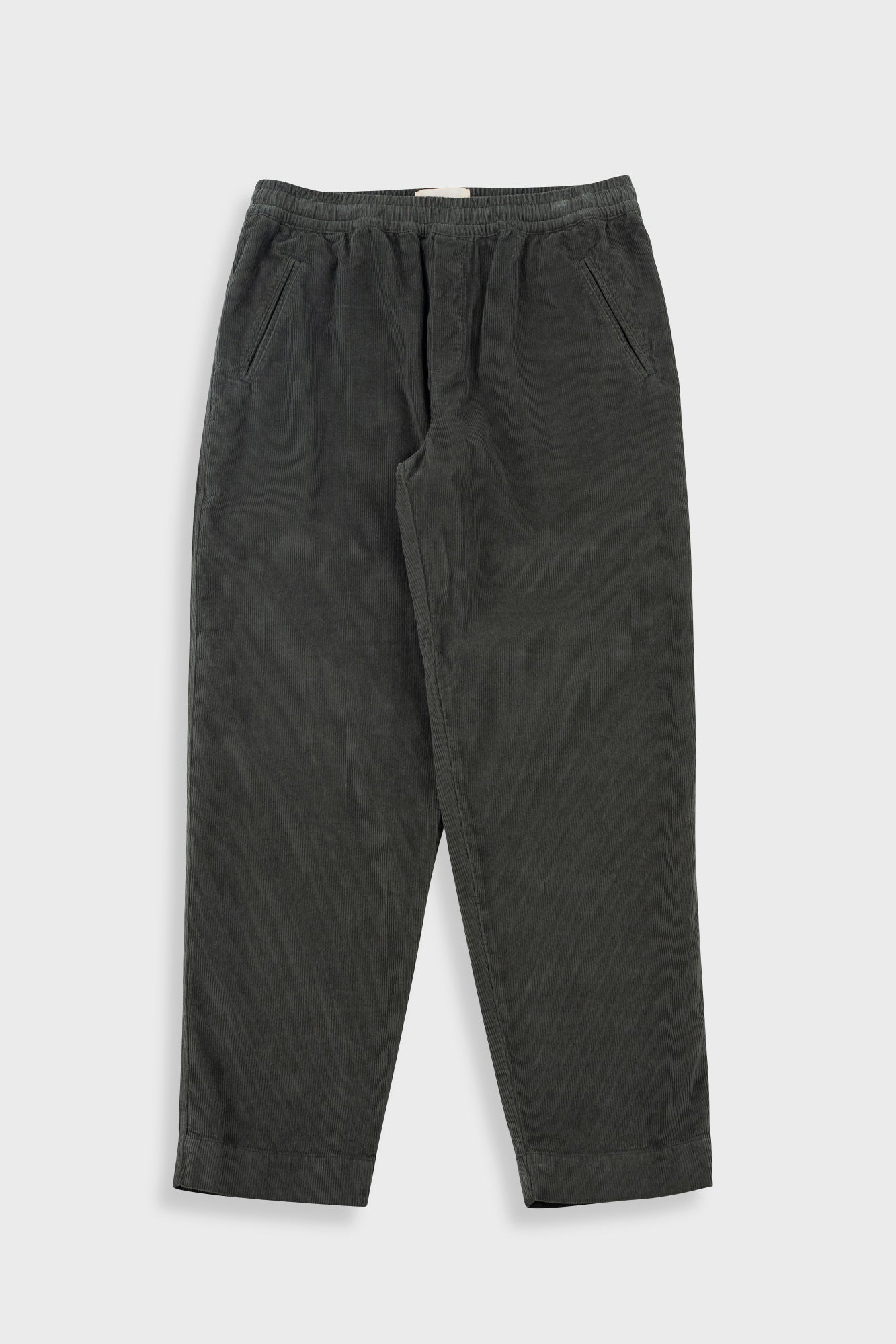 Dark gray pants on a light gray background