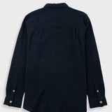 Navy checkered shirt on a white background