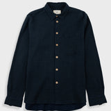 Navy checkered shirt on a white background