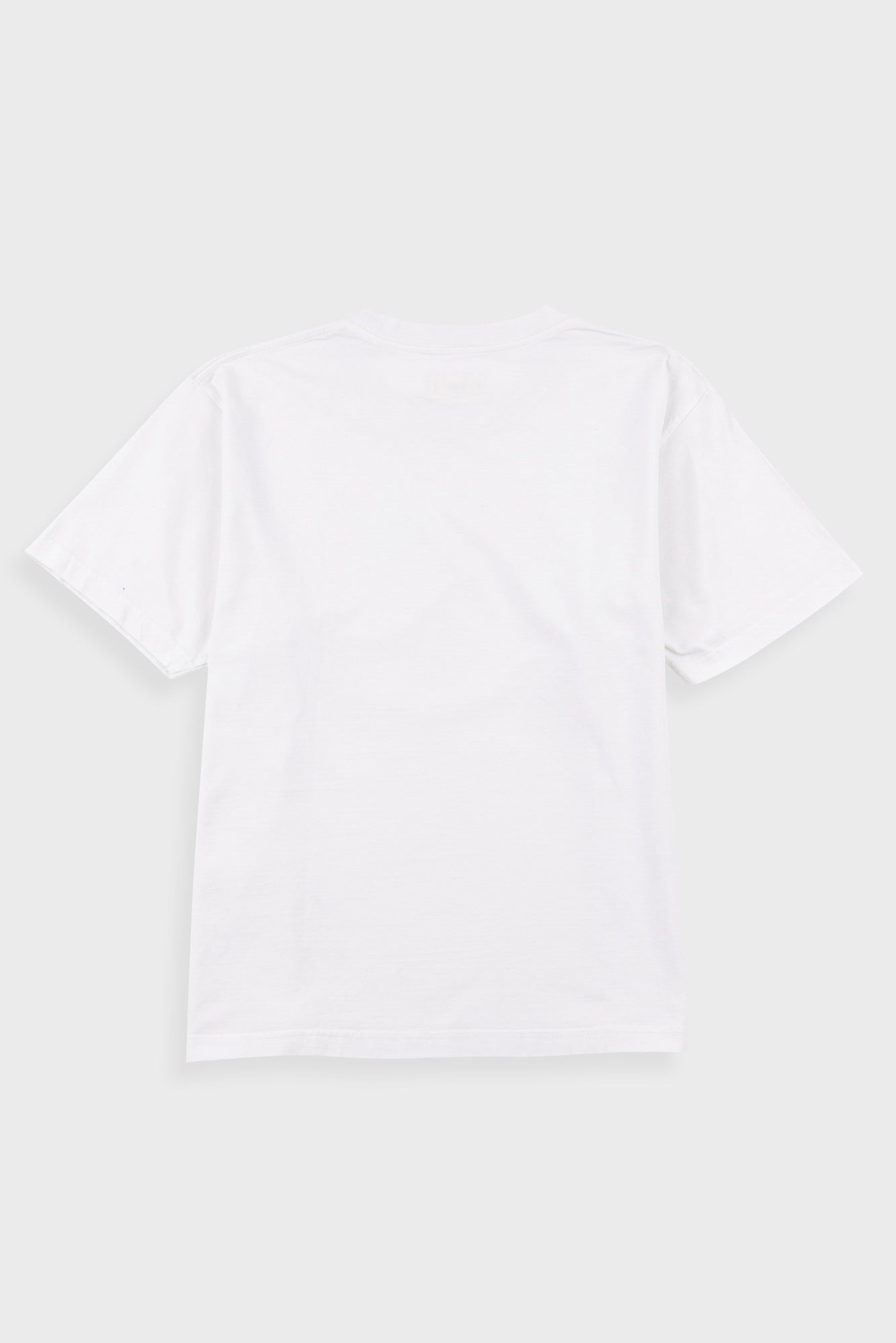A white short-sleeve crewneck t-shirt shown from the back, laid flat against a light gray background.