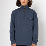 Man wearing a blue pullover with a pocket on a white background