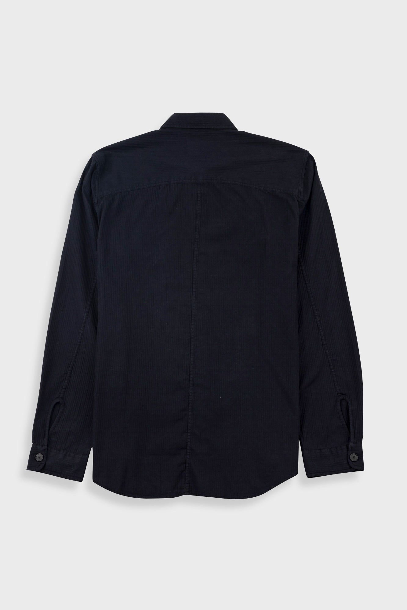 A dark navy blue long-sleeve button-up shirt shown from the back, laid flat against a light gray background.