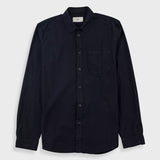 A dark navy blue long-sleeve button-up shirt with a single chest pocket, displayed flat against a light gray background.