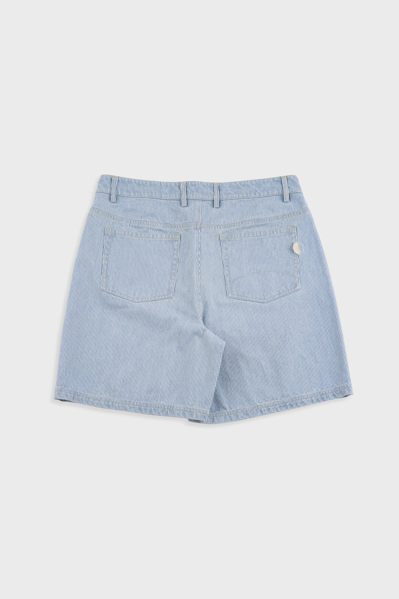 Light blue denim shorts on a white background