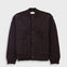 Dark brown cardigan on a light gray background