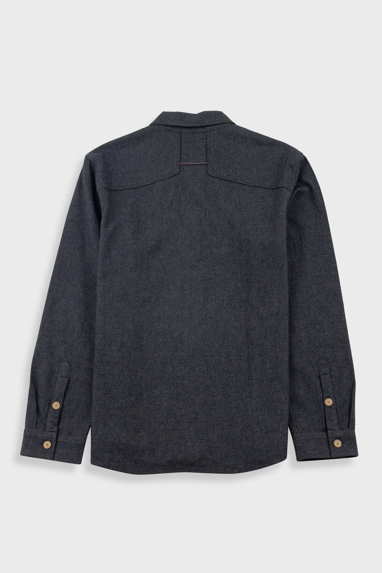 Dark grey flannel shirt against a white backdrop