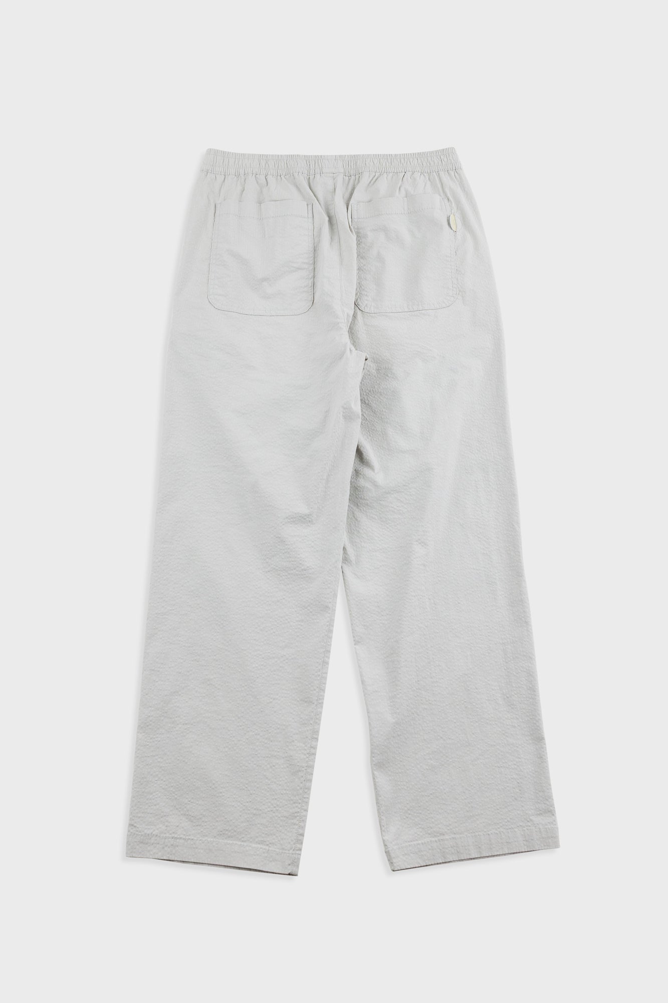 Light gray pants on a white background