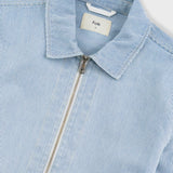 Light blue striped shirt with a brand label on a white background
