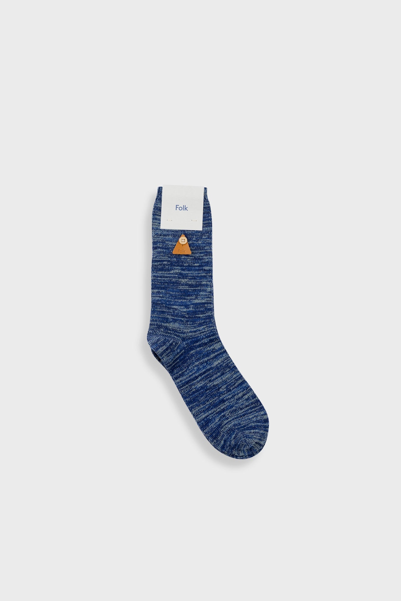 A single blue marled crew sock with a small orange and white mountain graphic near the cuff, shown against a light gray background.