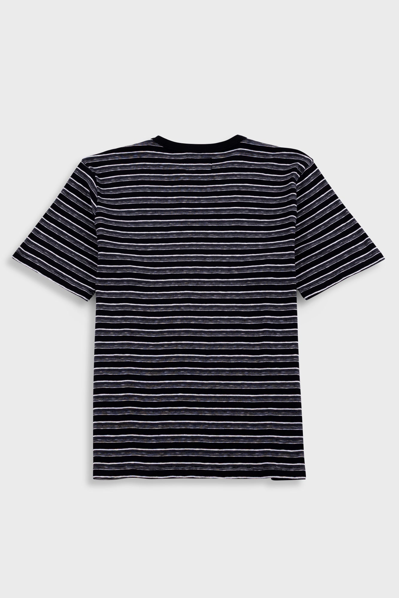 Black and white striped t-shirt on a light gray background