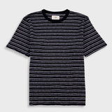 Black and white striped t-shirt on a light gray background