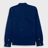 Blue shirt with buttons on a white background