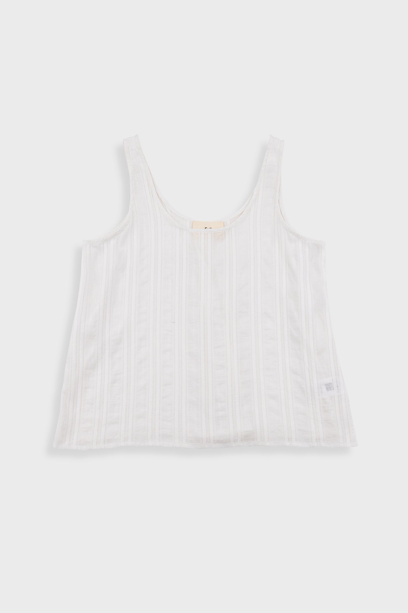 White tank top on a light gray background