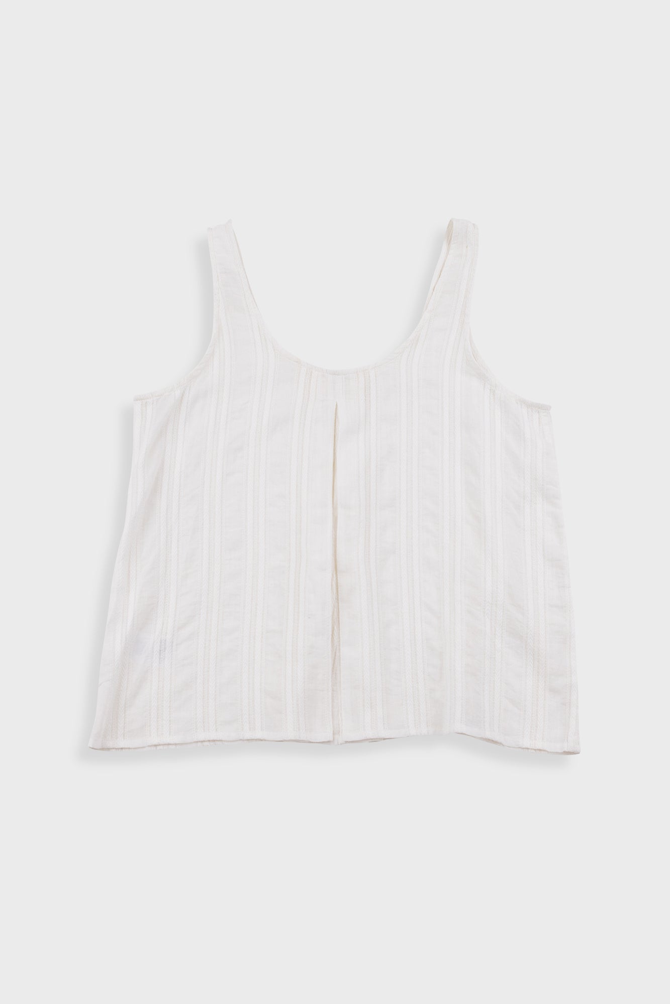 White tank top on a light gray background