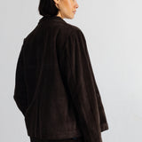 Model wearing a corduroy blazer and matching trousers