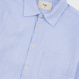 Light blue striped shirt with 'Folk' label on a white background