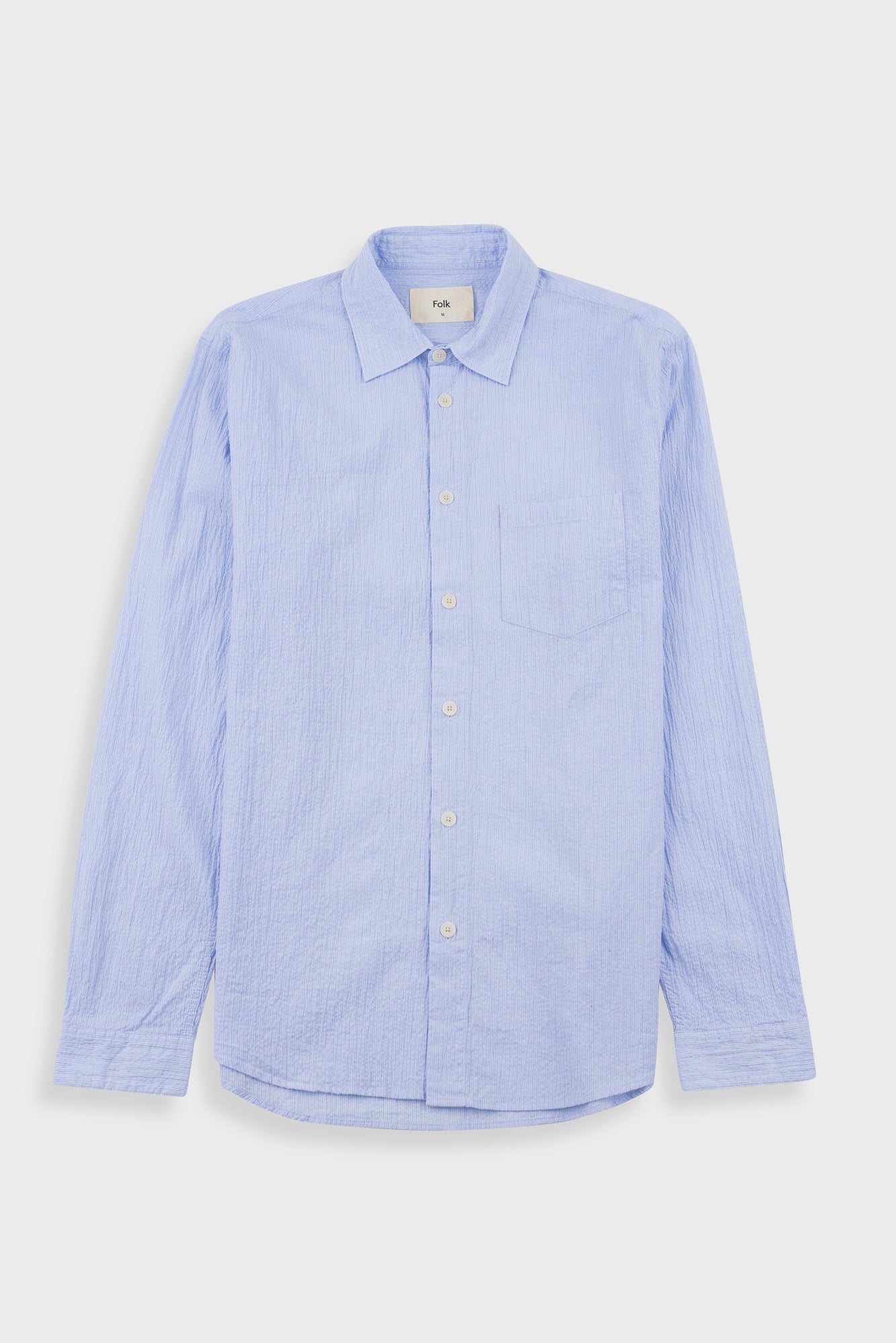 Light blue striped shirt on a white background