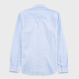 Light blue button-up shirt on a light gray background