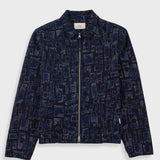 Dark blue patterned jacket on a light gray background