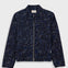 Dark blue patterned jacket on a light gray background