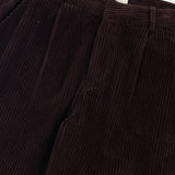 Brown corduroy pants with a visible brand label on a white background