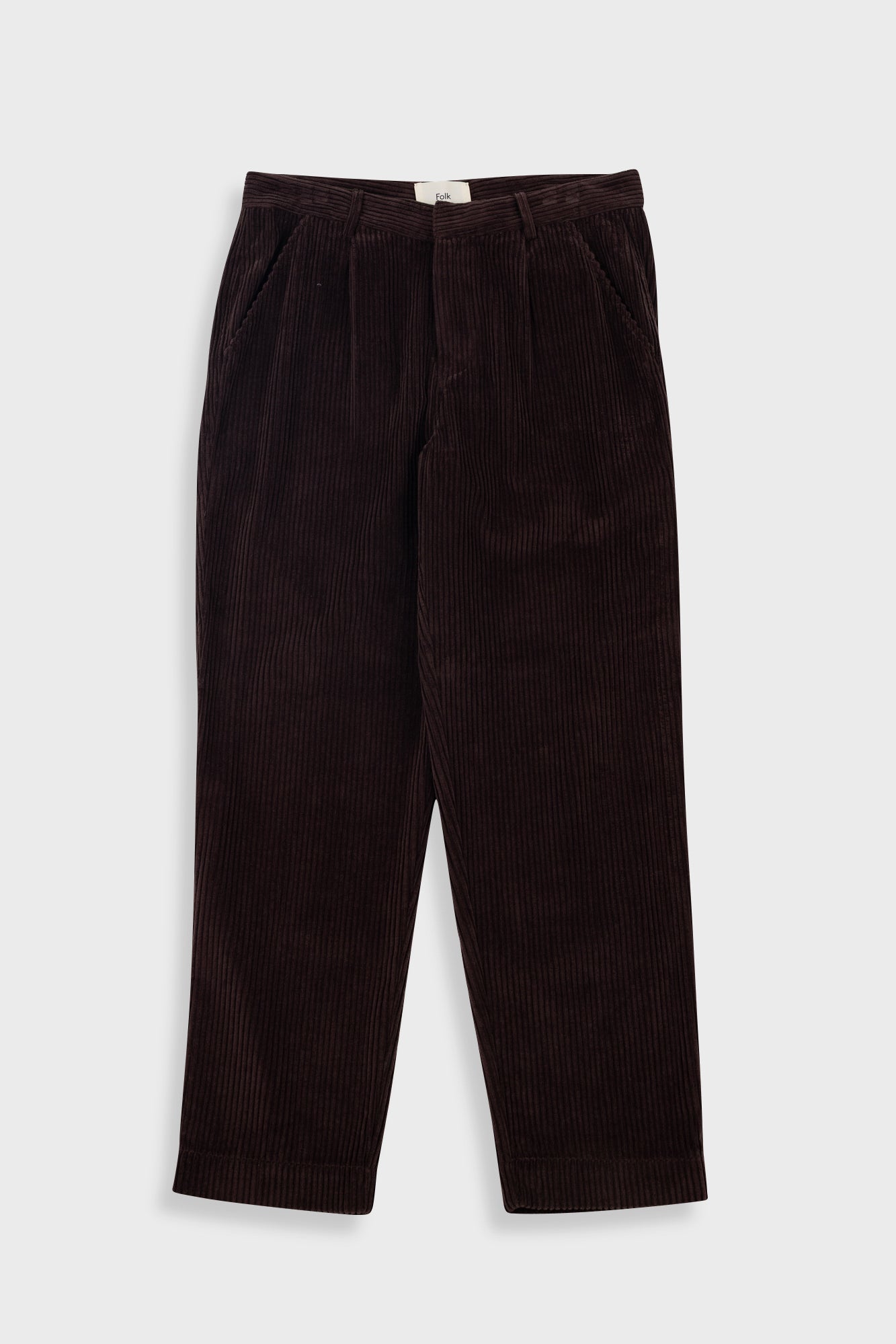 Brown corduroy pants on a light gray background