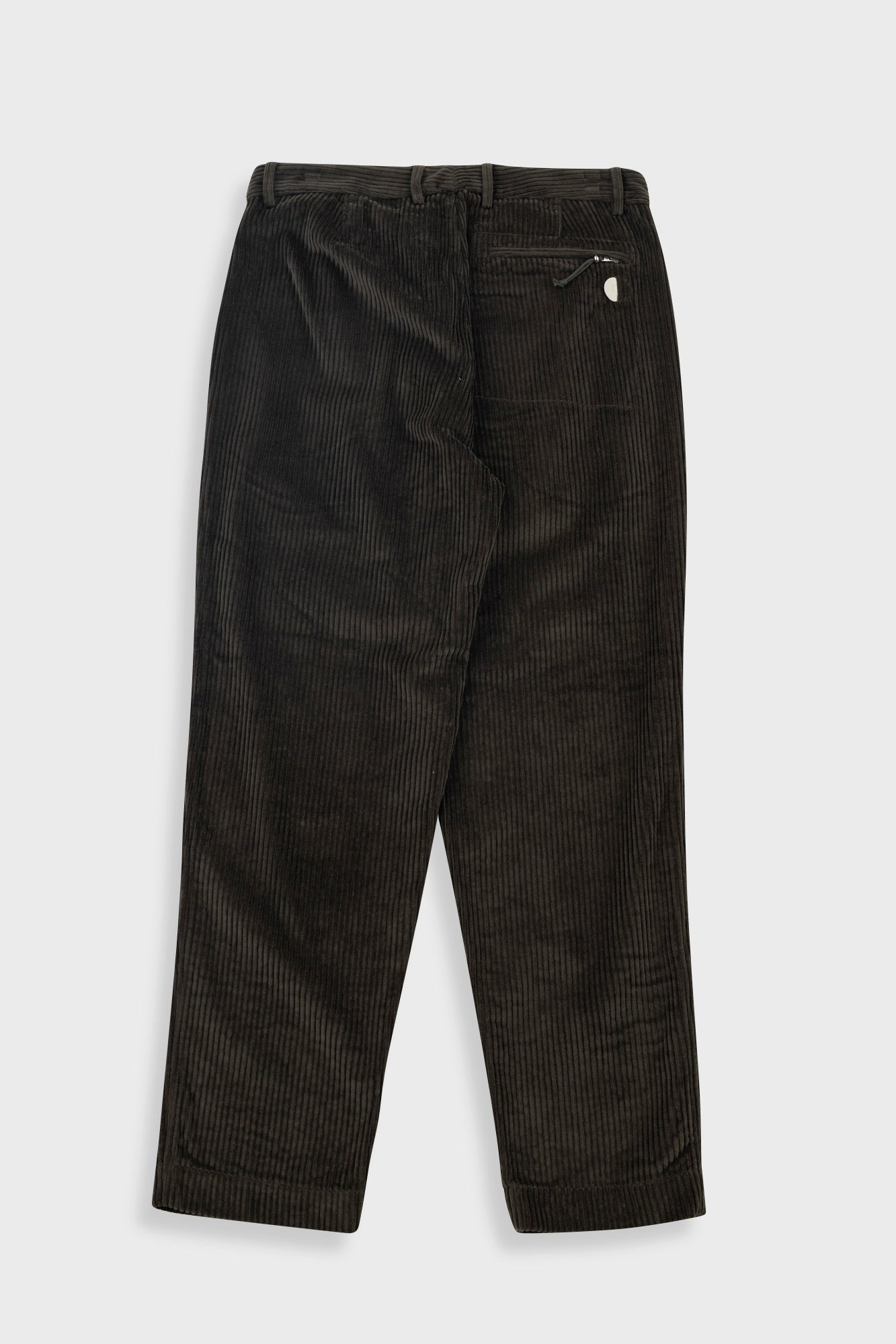 Black corduroy pants on a white background