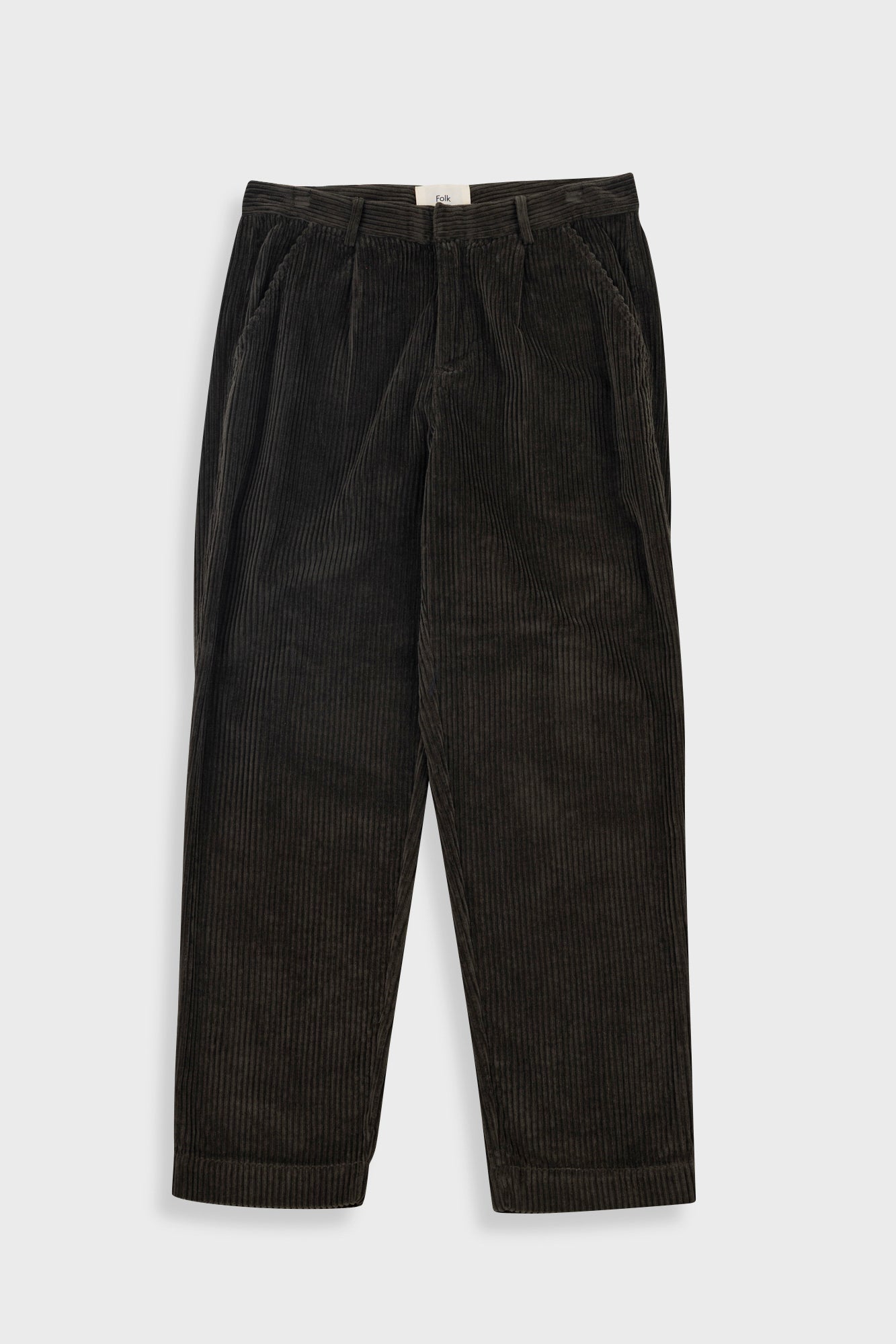 Dark brown corduroy pants on a light gray background