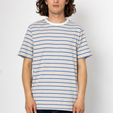 Person wearing a blue and white striped t-shirt against a plain background
