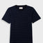 Black and white striped t-shirt on a light gray background