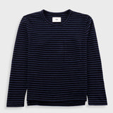 A navy blue long-sleeve crewneck shirt with thin horizontal white stripes and a single chest pocket, displayed flat against a light gray background.