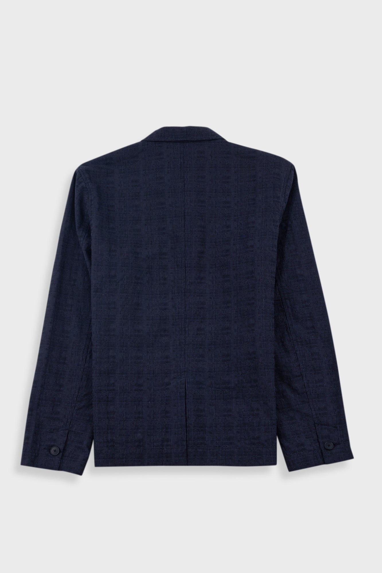 Grey blazer on a light gray background