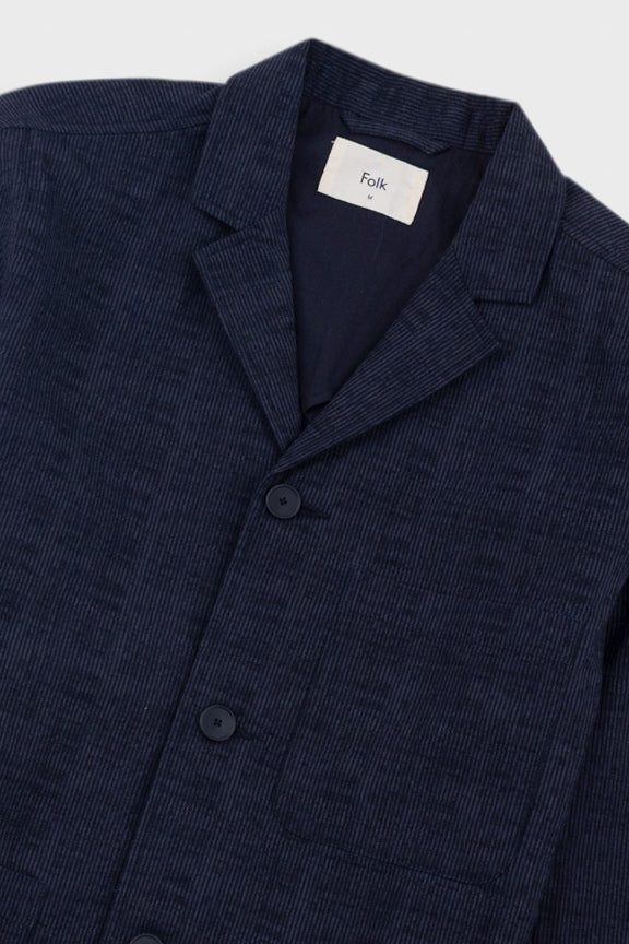 Grey blazer on a light gray background