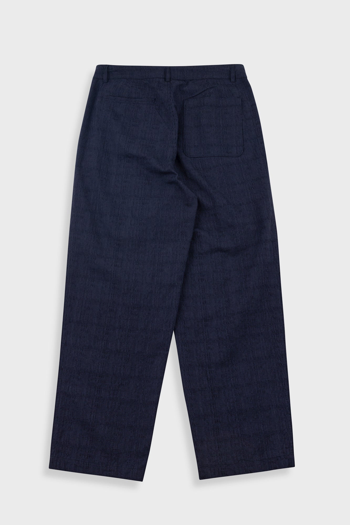 Navy blue pants on a light gray background