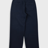 Navy blue pants on a light gray background