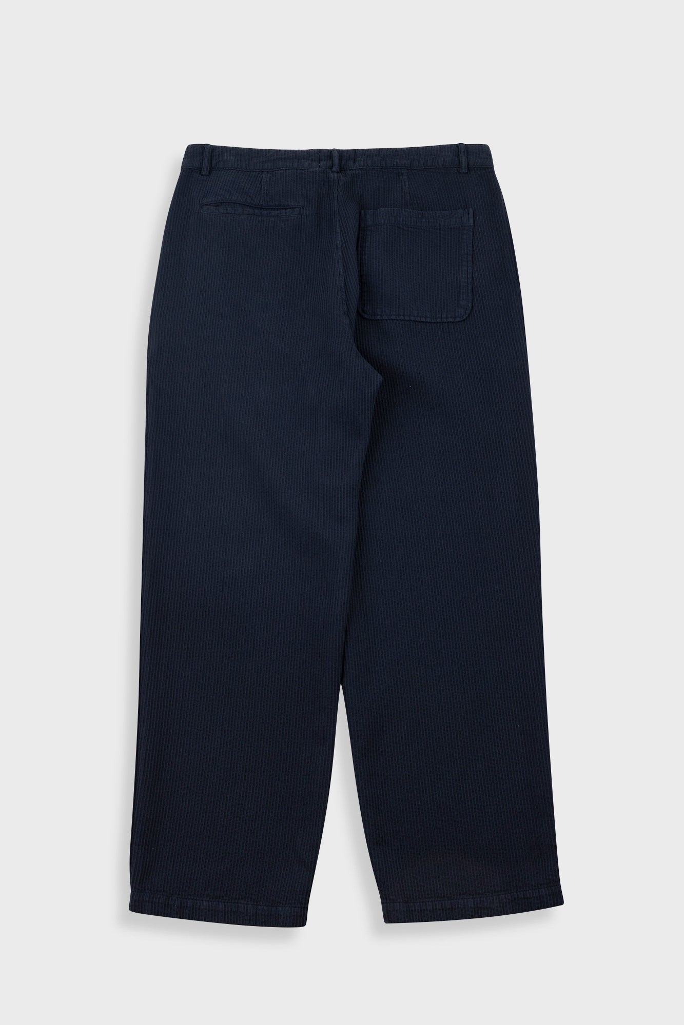 Navy blue pants on a light gray background