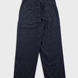 Black pants on a light gray background