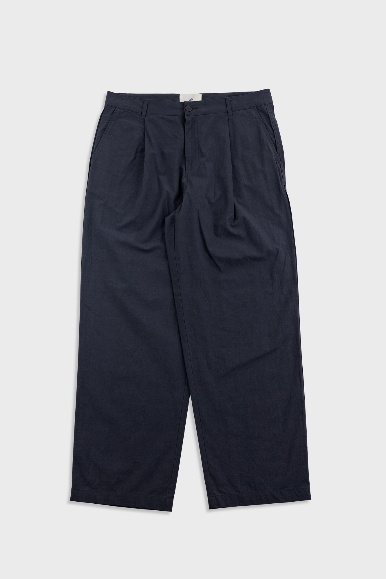 Black wide-leg pants on a light gray background